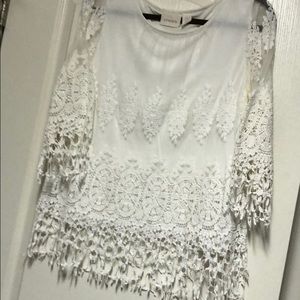 Delicate lace tunic style top